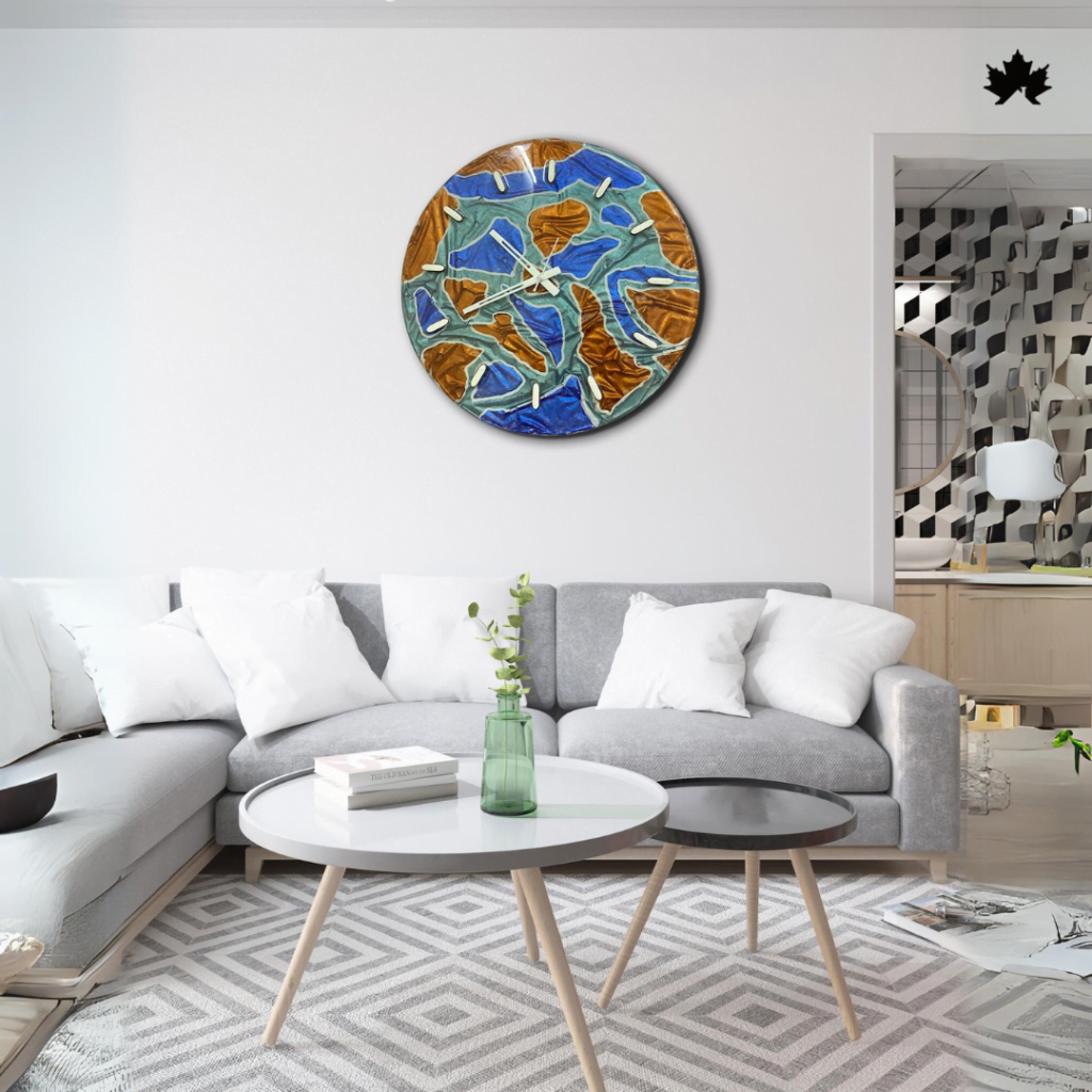 Autumnal Rhythm Unique Handcrafted Elegance wall clock displayed in a modern living room setting, featuring a unique handcrafted design with vibrant orange and blue leaf motifs on a round clock, enhancing the contemporary decor with its elegant and artistic appearance.