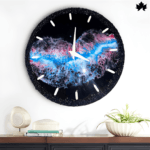 A stunning Luxury timepieces for home wall clock from Fankaarlok, the Cosmic Blaze features a dynamic, star-like resin art pattern with vibrant blue and pink hues on a black background, highlighting the contrast and depth of a cosmic scene, ideal for modern home interiors.